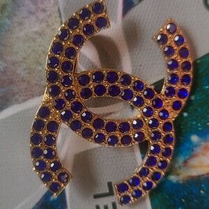Goldtone Brooch with Dark Blue Gems